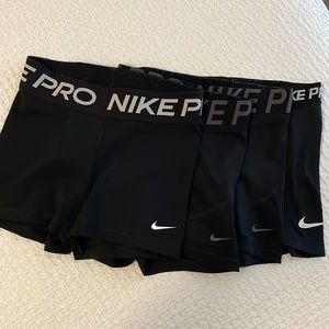 Nike Pro spandex 4 pairs size small